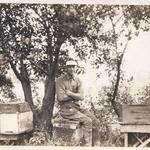 Frank Held tending to his bees.