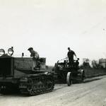 Frank Held's sons, Clarence and Oliver, operating their Cletrac tractor on their 106 acre farm in South Bloomfield, Ohio. After the Frank Held Tractor Company was sold, he became a Cletrac distributor. 